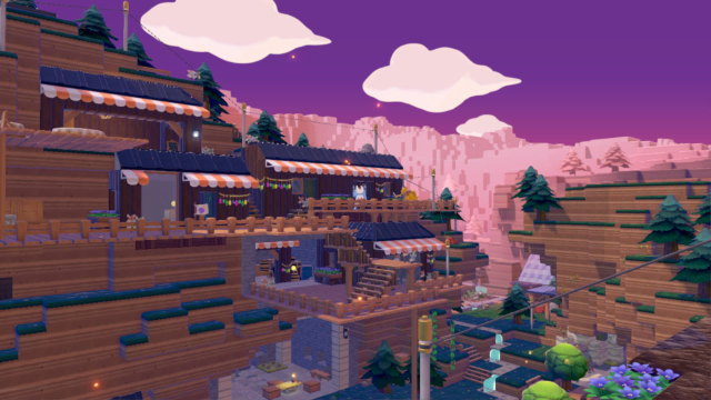 screenshot from Pokémon Pokopia : a village with a few houses made of wood, perched on a cliff side in a mountainous area, at sunset. Houses are connected to each oher by suspended wooden planks and pathways.